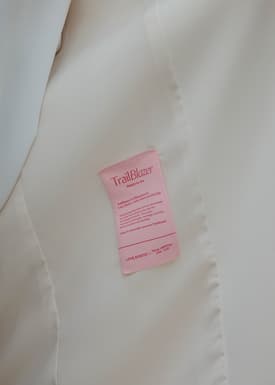 Love Bonito x AAGC Limited-edition RuchedReady® Moira Belted Collarless Blazer (in Tofu)