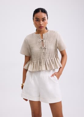 Oxford Pintuck Notched Peplum Top
