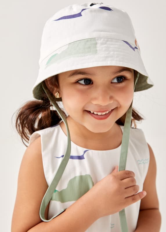 Girl wearing shop bucket hat