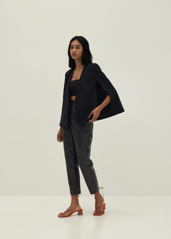Cape with top slits blazer