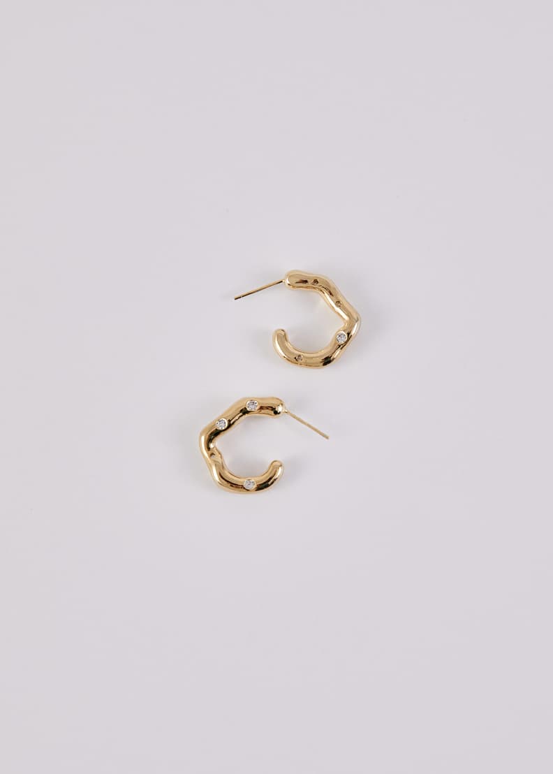 Gold wavy top hoop earrings