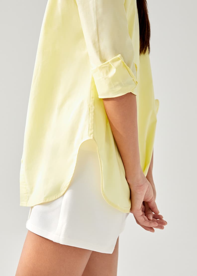 bright yellow button down shirt