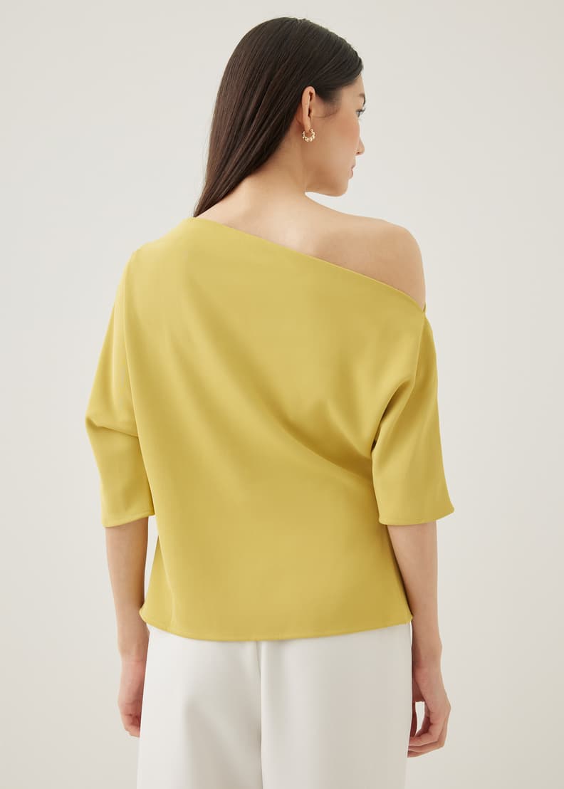 Yellow asymmetrical top store