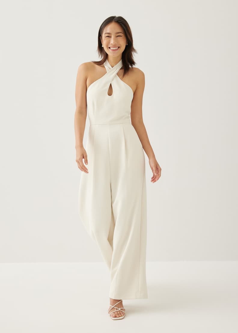 Love triangle halter neck open back shop jumpsuit with thigh split in white