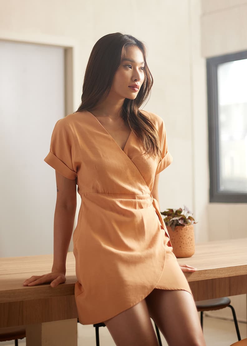 Geodese wrap front pencil dress top